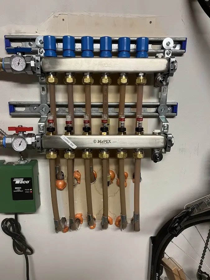 Plumber performing Gas Line Installation at a residential property in Gentry